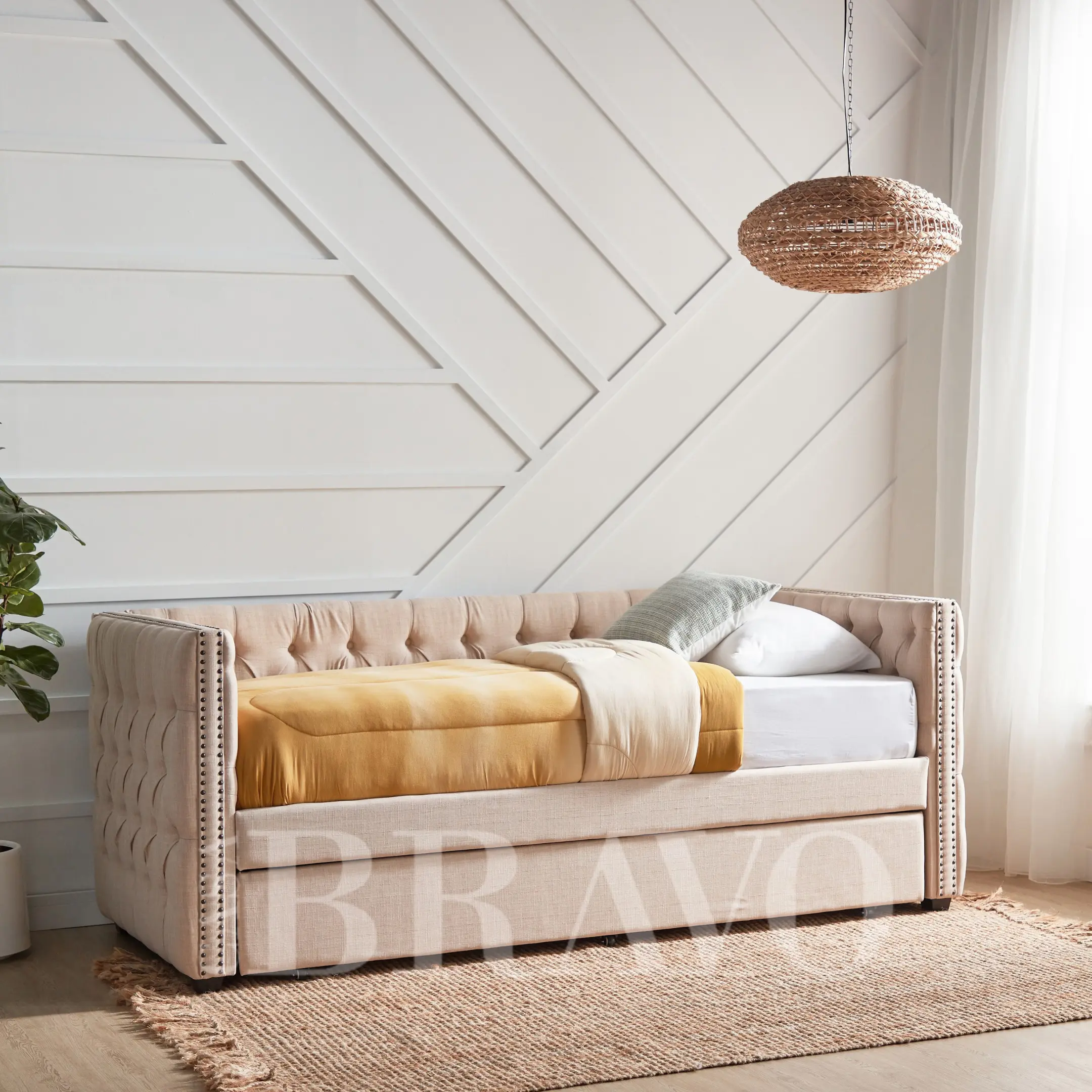 A luxurious daybed upholstered with a layer of deep-fill furnishings and soft linen colors, ideal for elevating any modern living space.